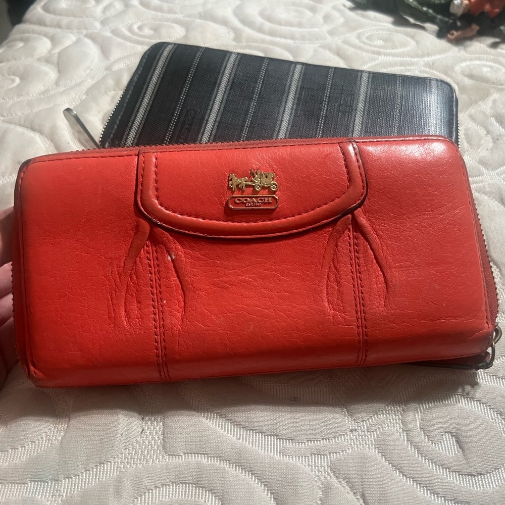 Coach wallet with zipper.